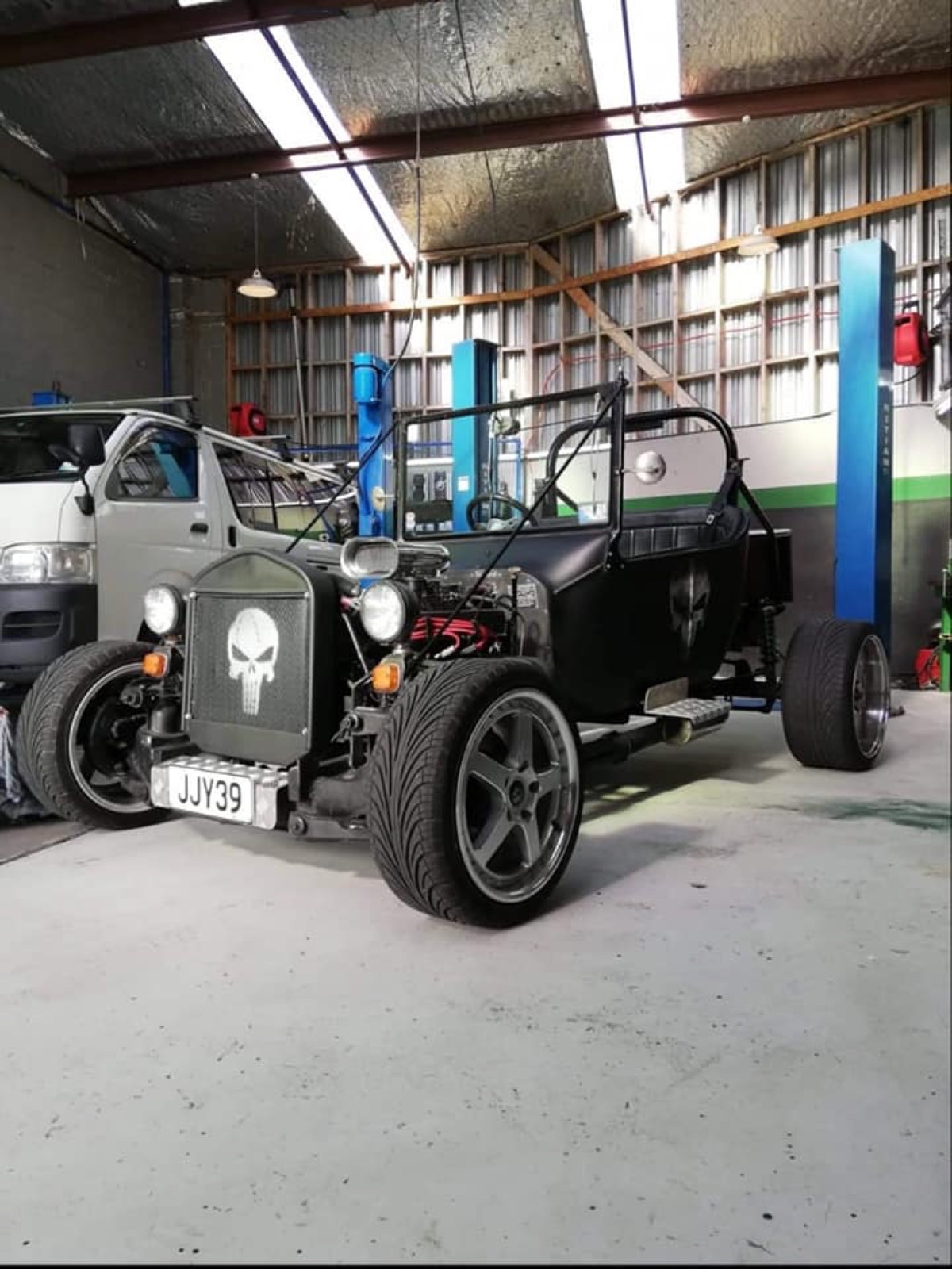 Custom hot rod build at Precision Automotive — specialty work alongside daily drivers